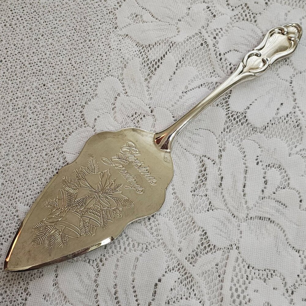 Christmas Greetings Silverplate Pie Server 11.5" ornate handle scrolls bells vtg